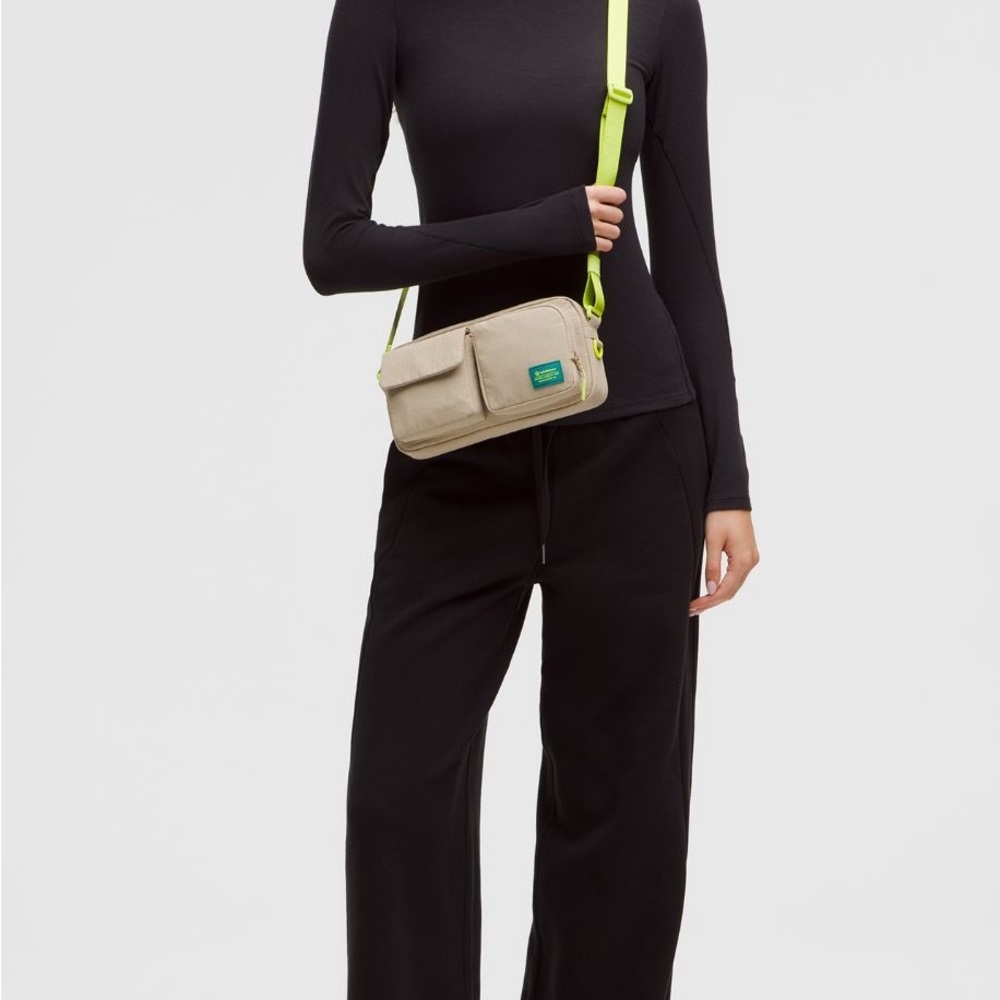 Trendy Lululemon Tan Crossbody Bag with Neon Accents. Sold out online. NWT